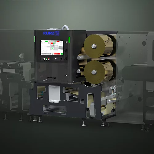 High-tech KURZ embellishment machine with touchscreen and colorful print material.