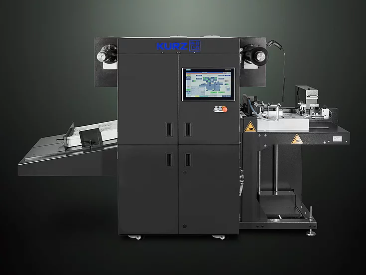 Digital Embellishment Solution from KURZ with open compartment, processing stacked printed sheets labeled "VIP".