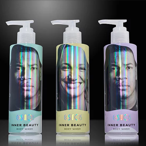Three body wash bottles with faces and holographic “Inner Beauty” label design.