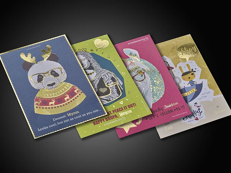 Four colorful greeting cards with gold foil details, featuring a panda in festive attire, a lion queen, a rabbit with glasses, and a pirate bunny, each with playful designs and personalized names.