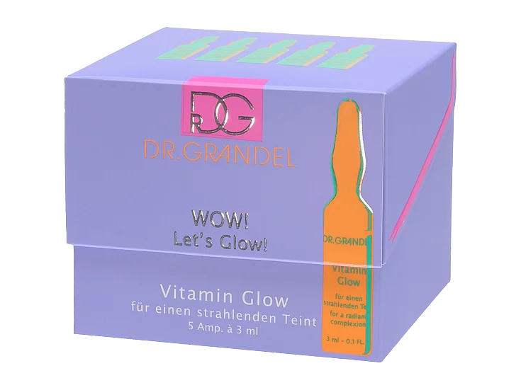 Purple box packaging for Dr. Grandel’s ‘WOW! Let’s Glow!’ Vitamin Glow product, featuring an orange ampoule illustration and text in English and German.