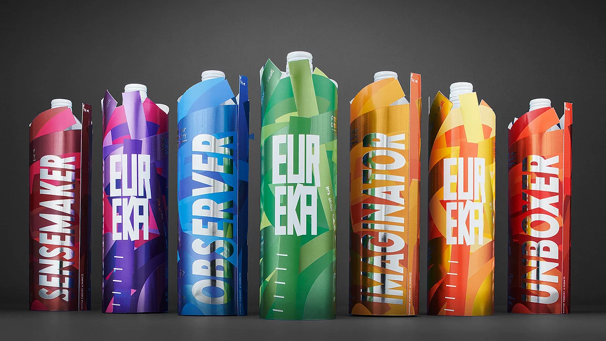 Colorful beverage-style packaging tubes with bold typography and creative names like Sensemaker, Observer, Imaginator, and Unboxer, showcasing KURZ’s advanced printing and finishing techniques.