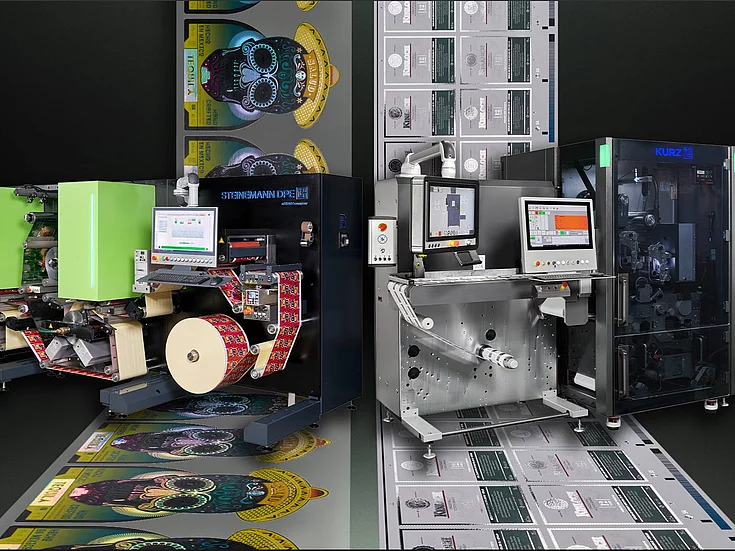 KURZ digital embellishment line featuring DM-UNILINER and STEINEMANN DPE units with integrated foil application and inspection systems for label and packaging production.