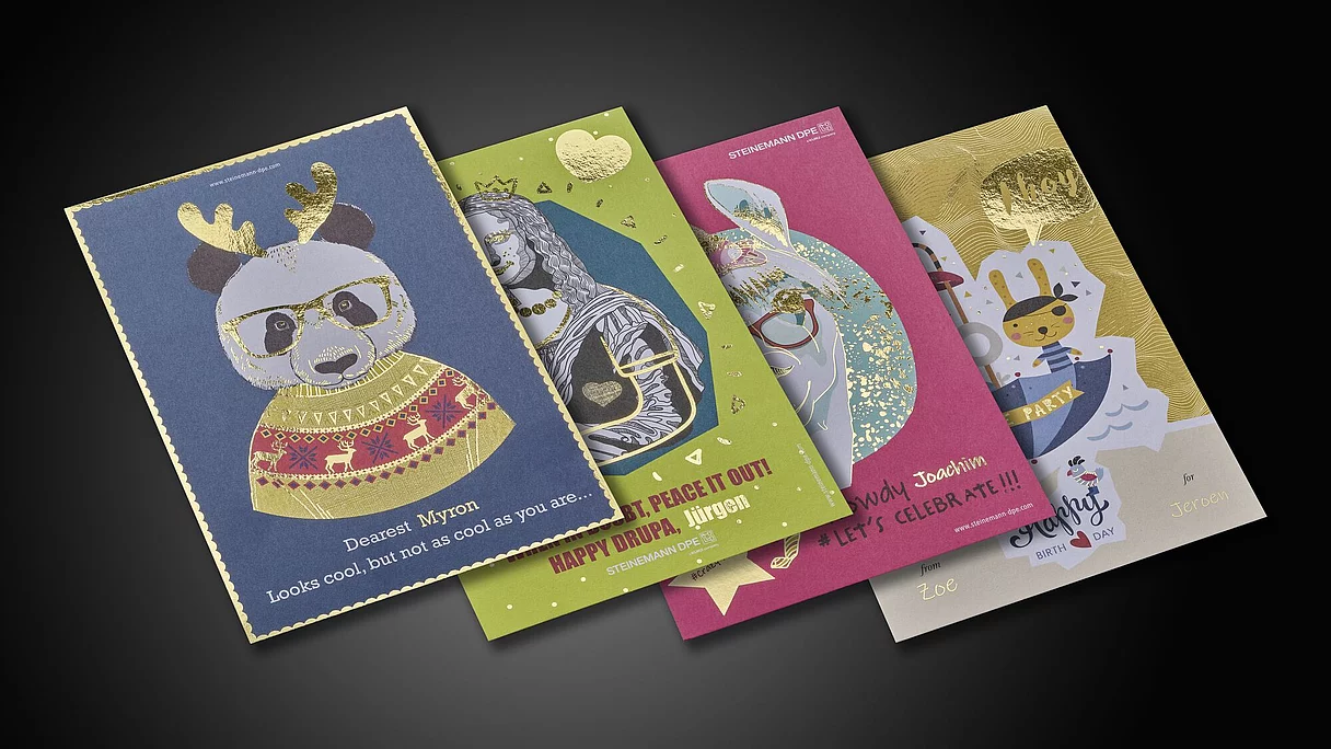 Four colorful greeting cards with gold foil details, featuring a panda in festive attire, a lion queen, a rabbit with glasses, and a pirate bunny, each with playful designs and personalized names.